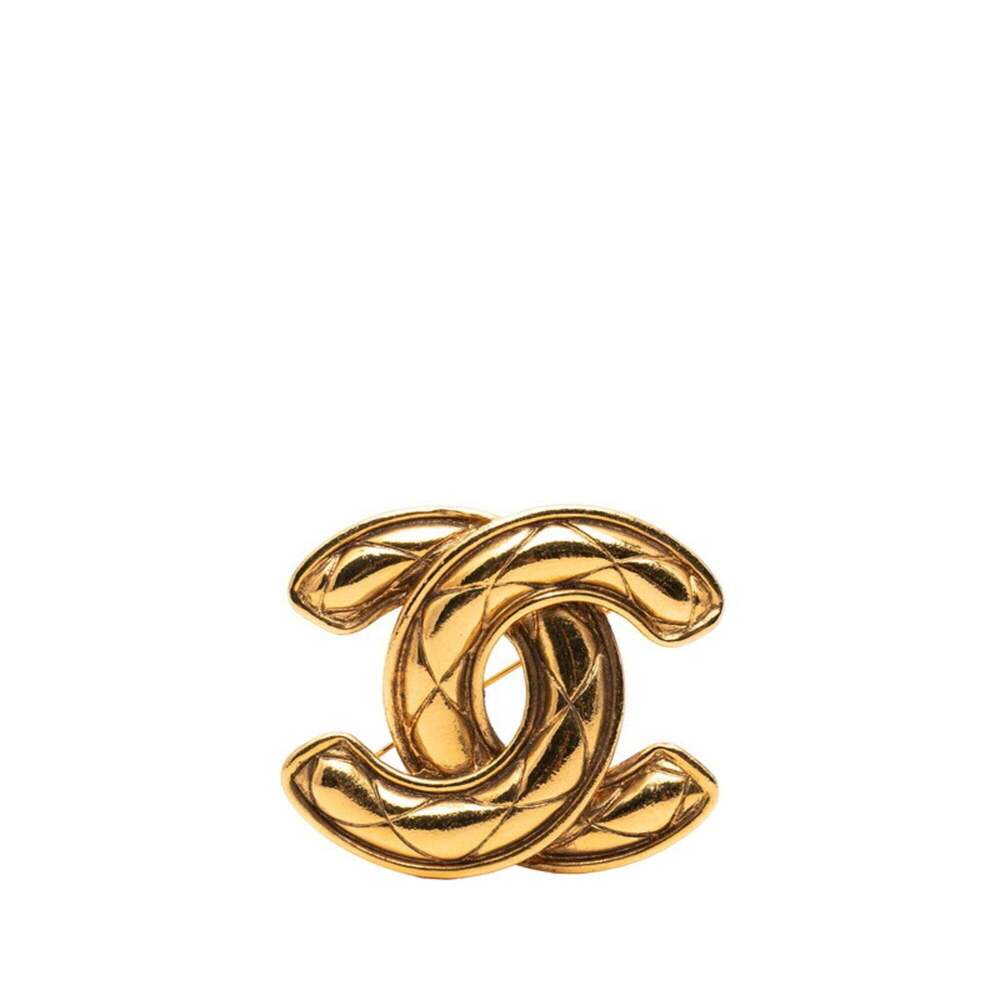 CHANEL Gold Logo Brooch